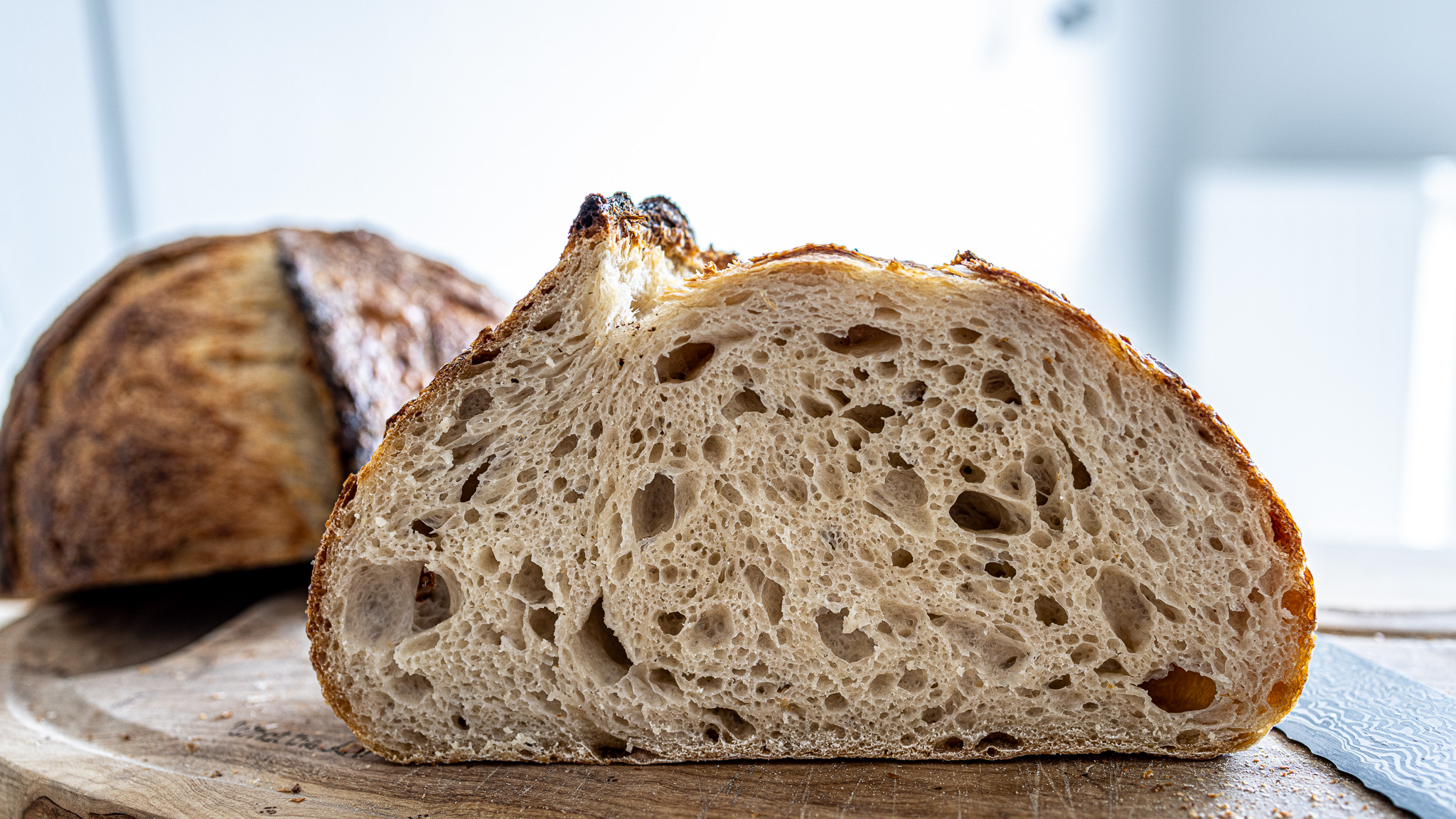 Beautiful crusty sourdough bread with open crumb